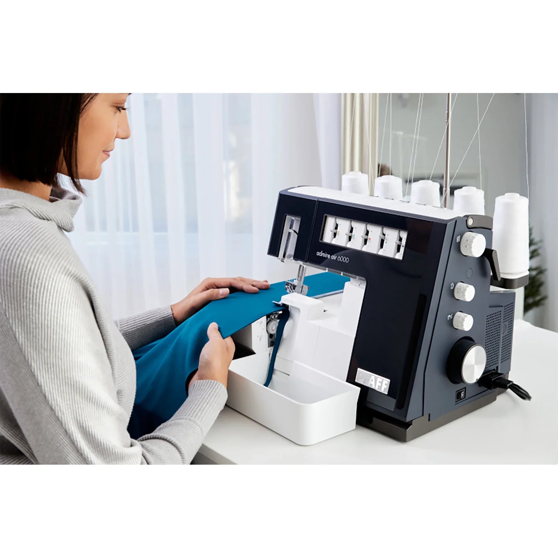 A Sample of PFAFF admire air 6000 Black Coverlock Machine.