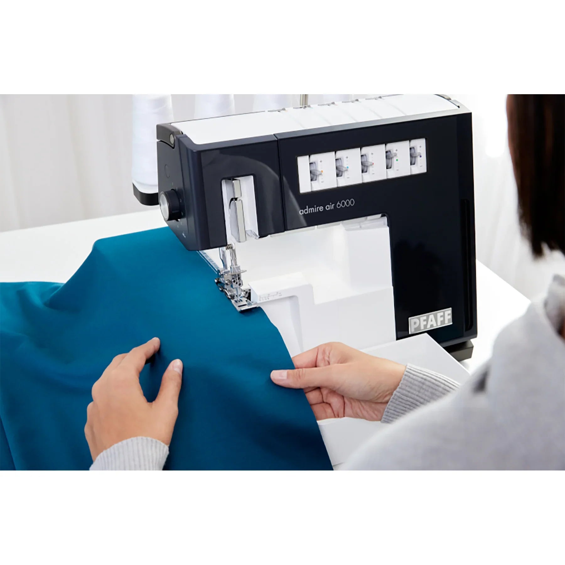 A Sample of PFAFF admire air 6000 Black Coverlock Machine.