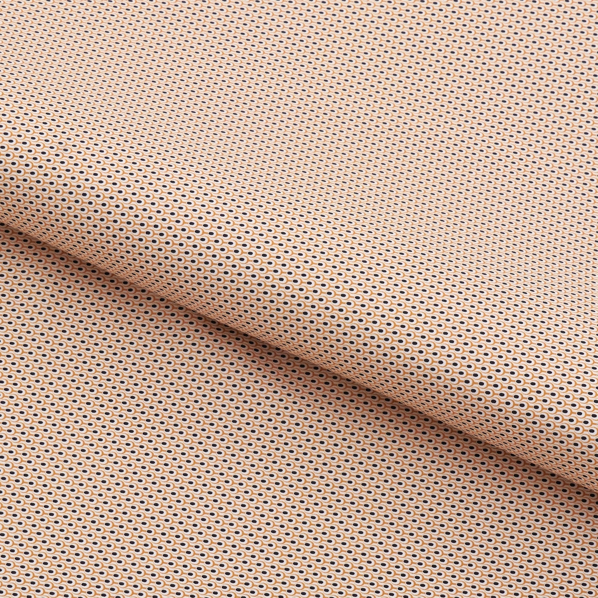 A piece of Peacock Tail Printed On Recycled Spandex Fabric in color black/gold.