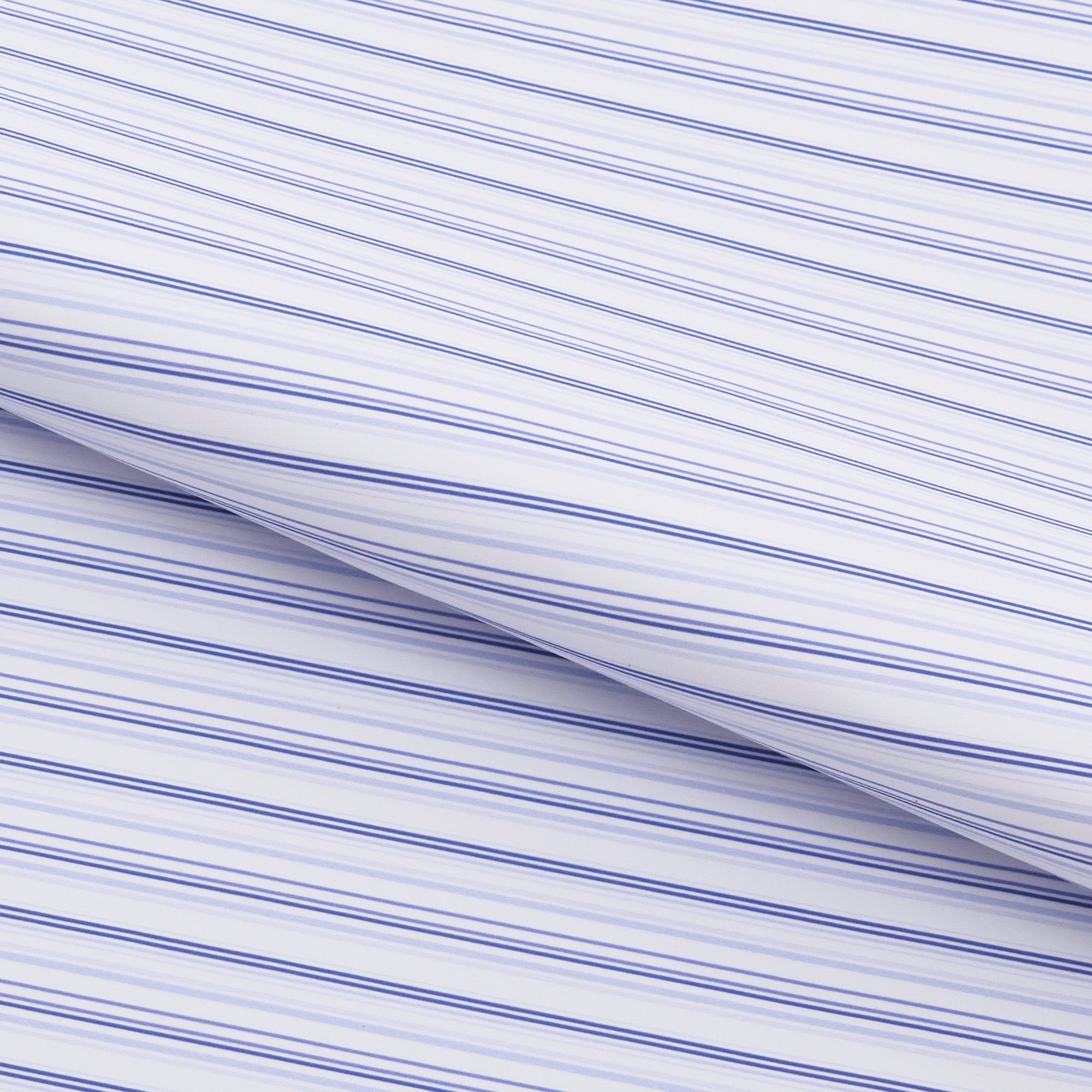 A piece of Diverse Shade of Stripes Printed On Recycled Spandex Fabric in color white/lavender.