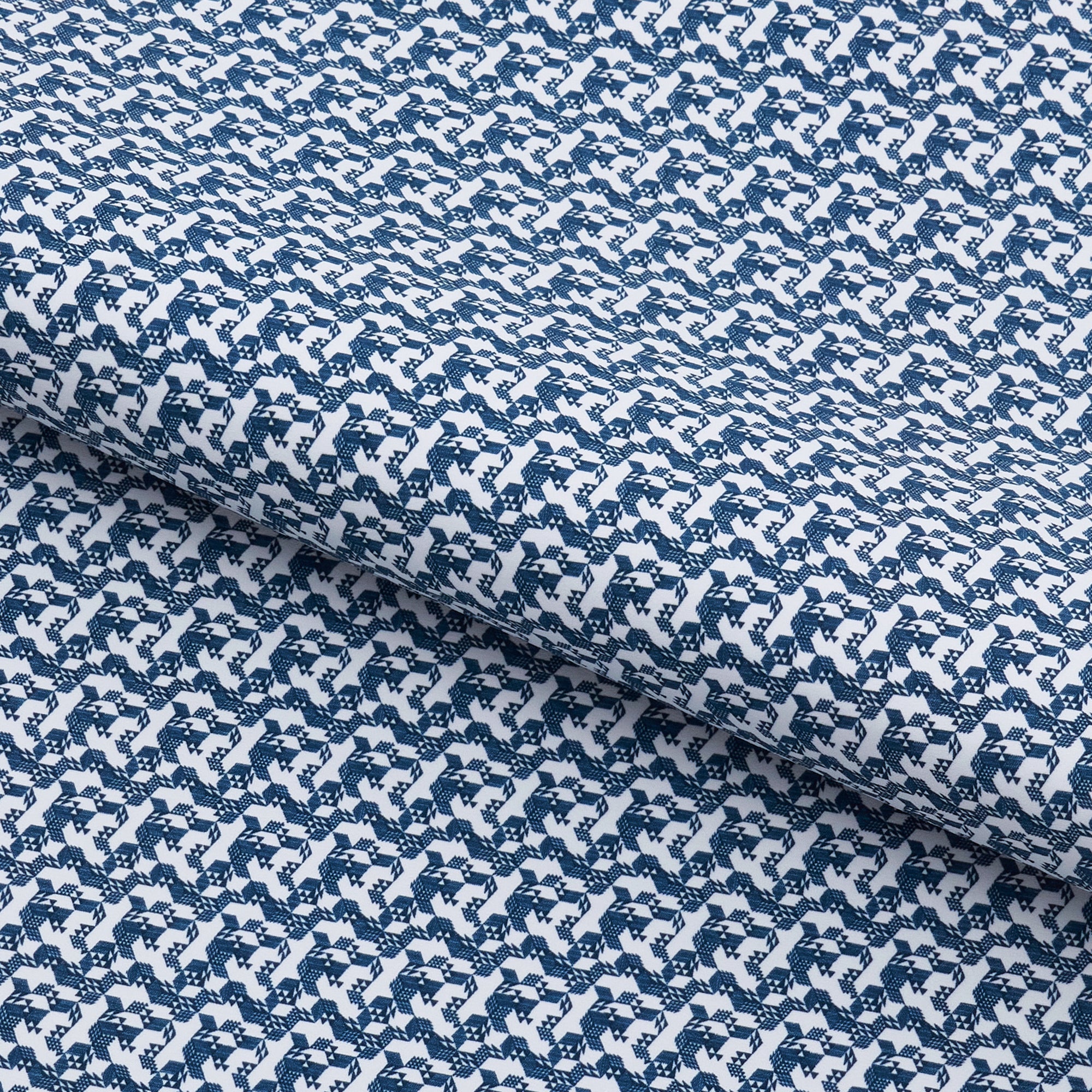 A piece of Tetris Blocks Printed On Recycled Spandex Fabric in color white/navy.