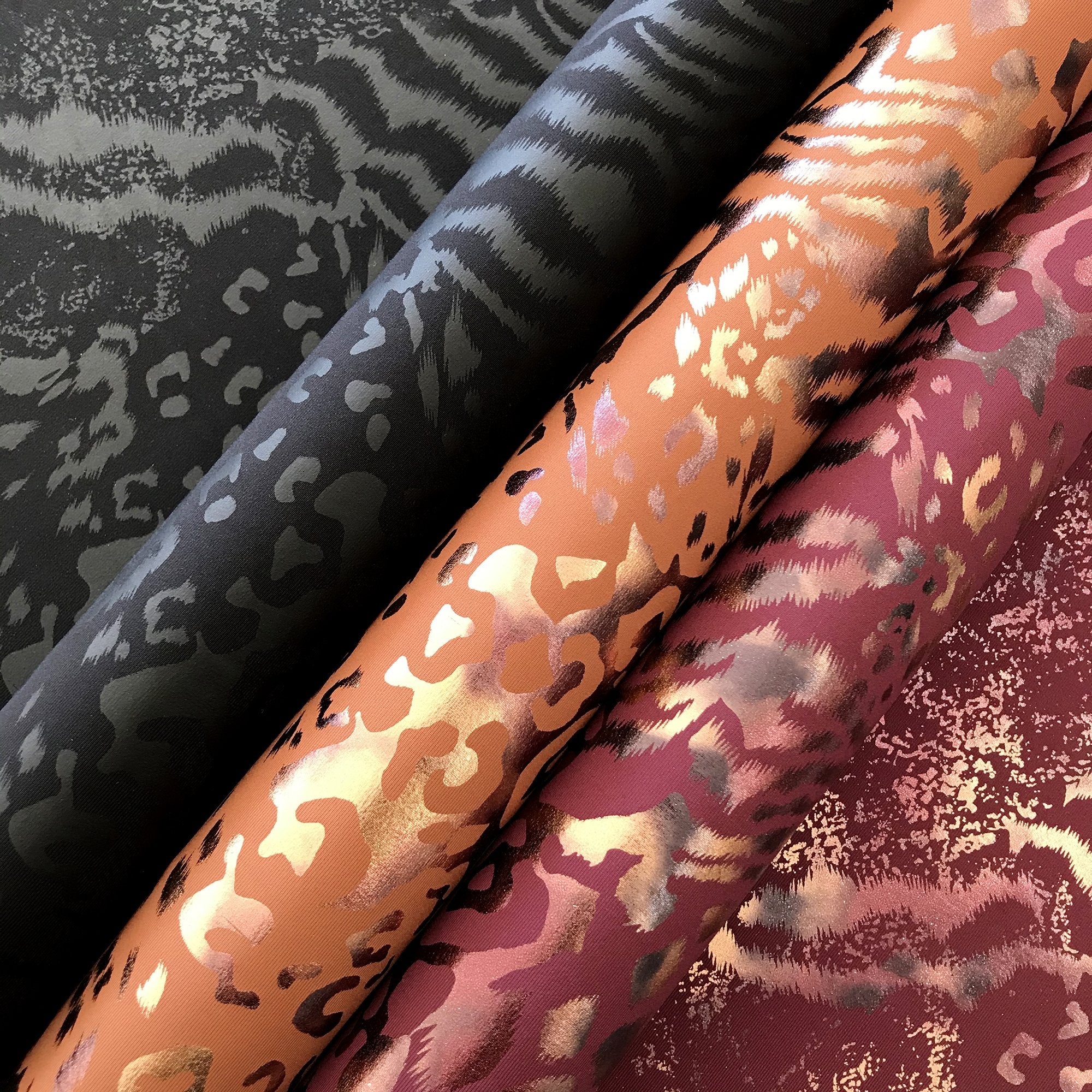 A sample of jungle patch foil printed superflex in all available colors at blue moon fabrics.