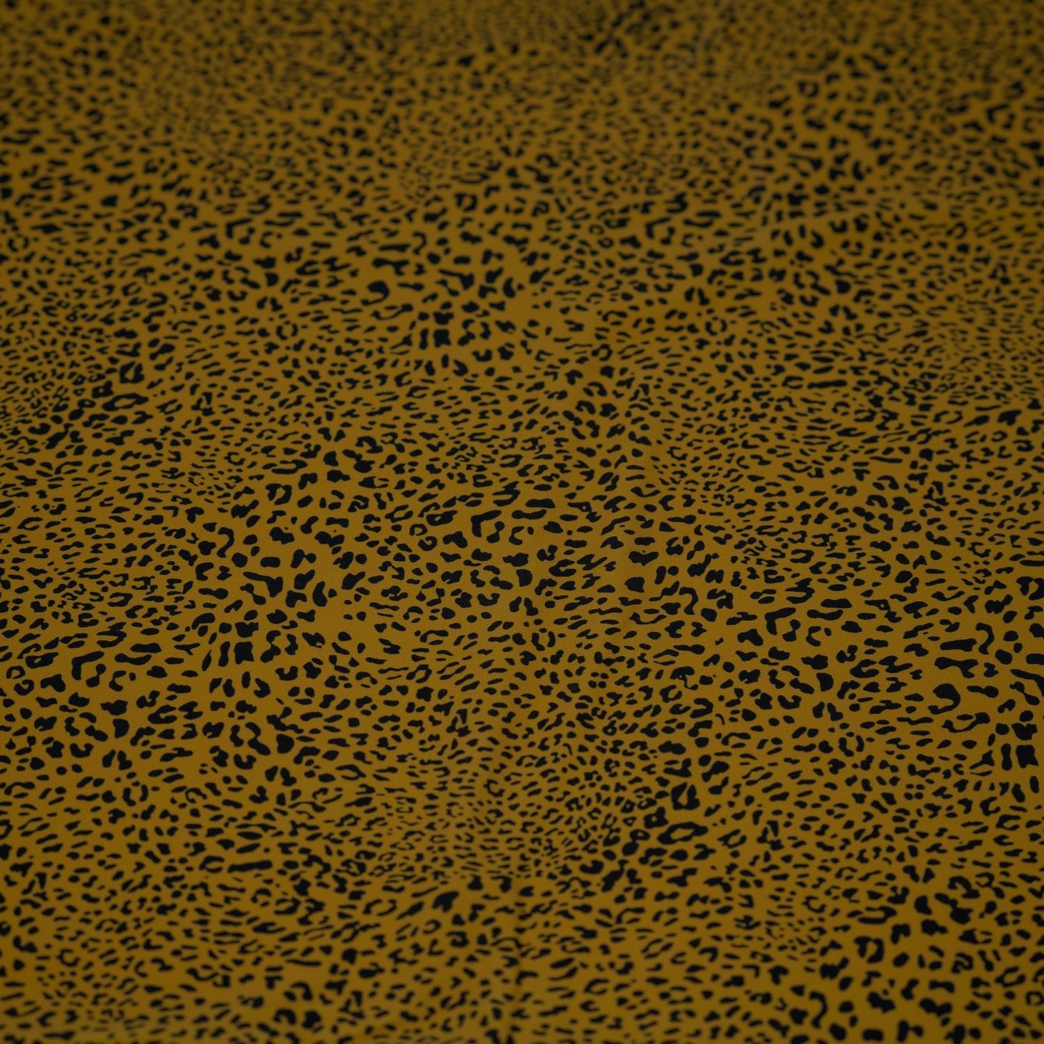 Detailed shot of Finely Spotted Cheetah Printed Spandex.