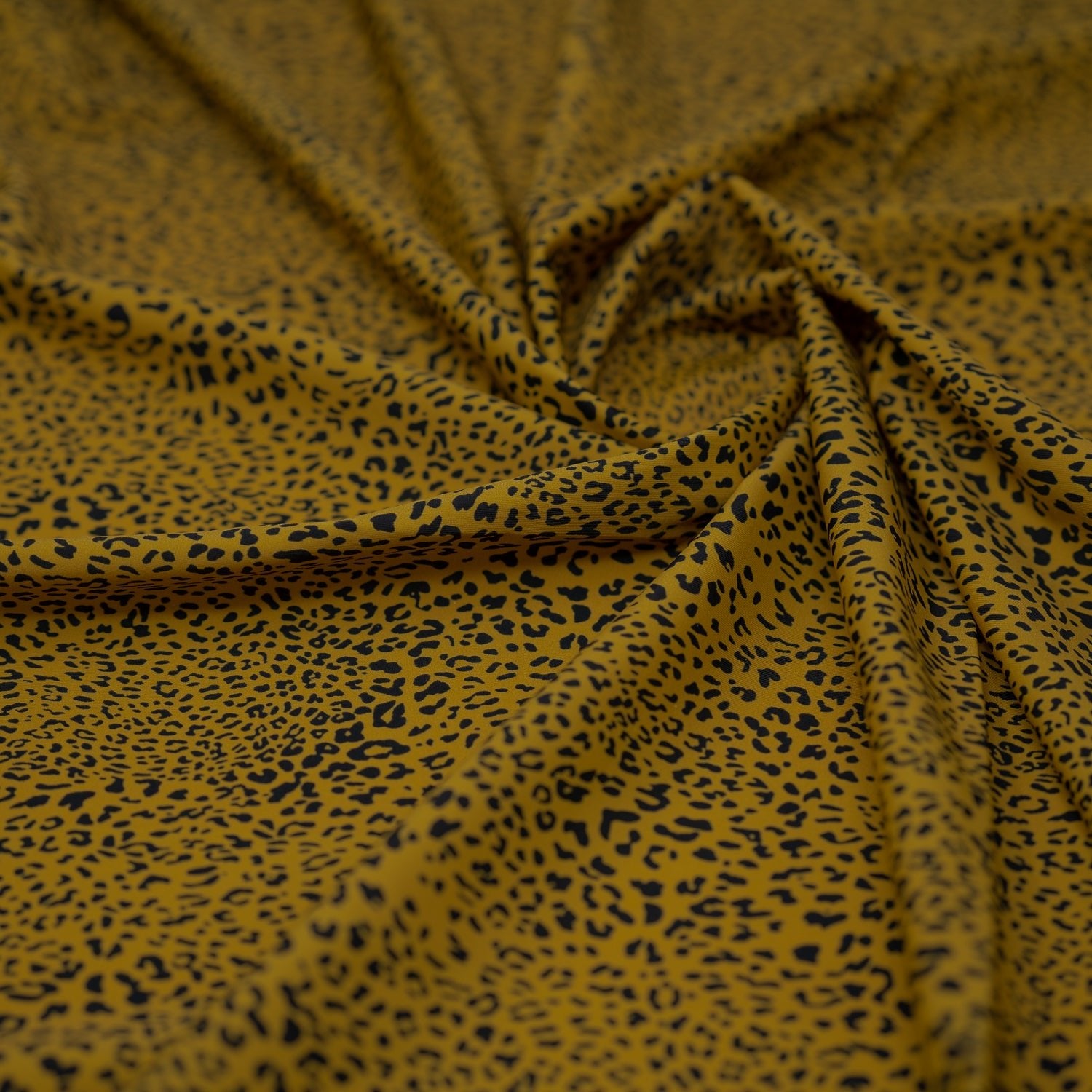 Detailed shot of Finely Spotted Cheetah Printed Spandex.