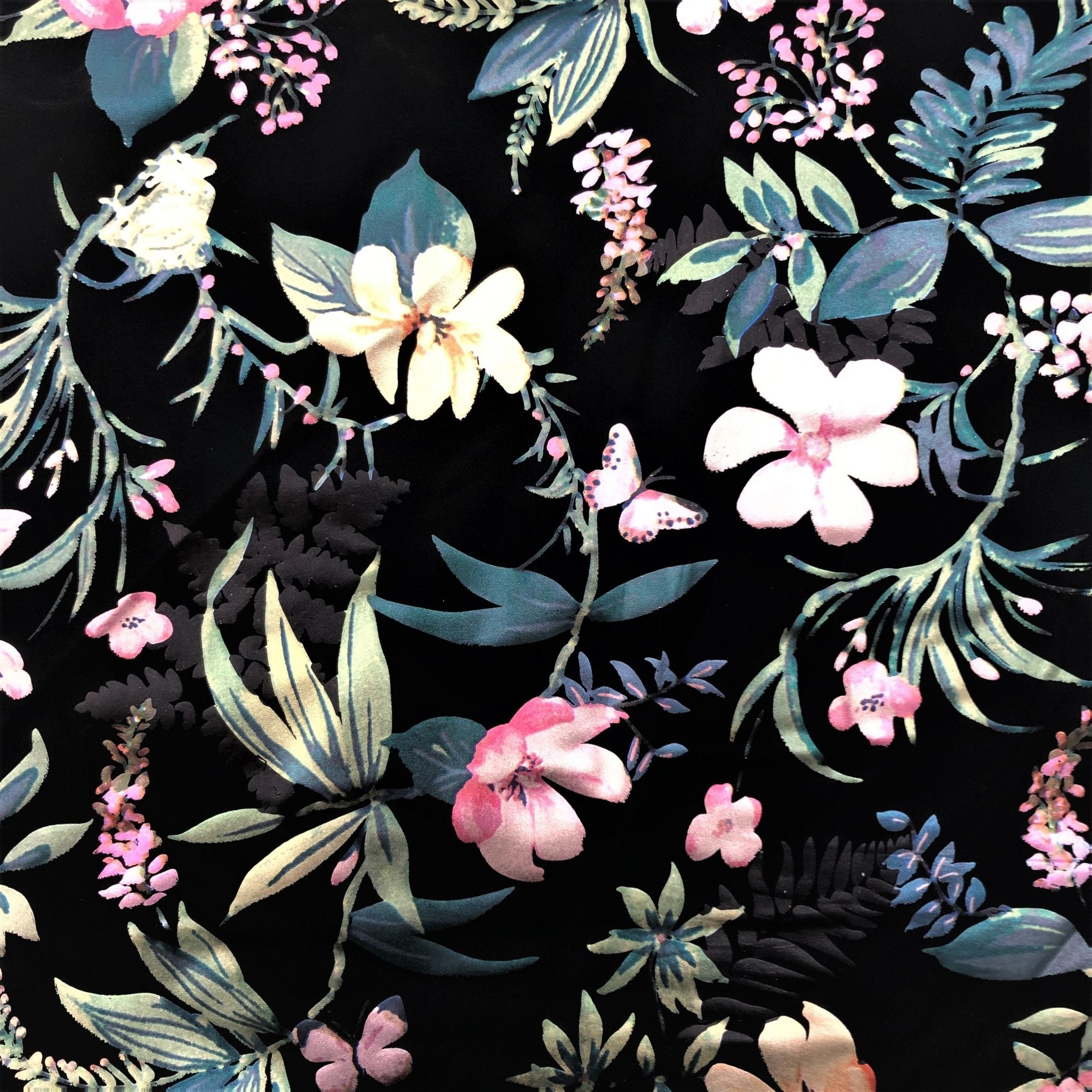 A flat sample of lotus printed spandex with all over foil.