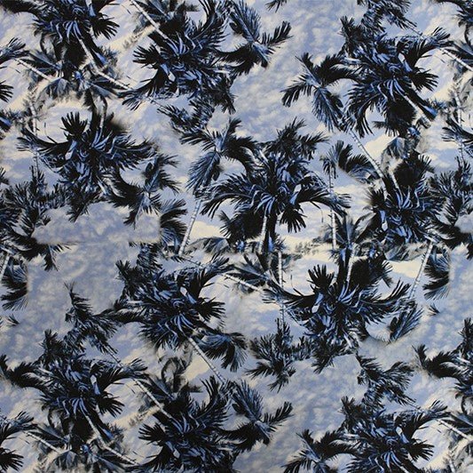A flat sample of Blue Palm Tree Printed Spandex.