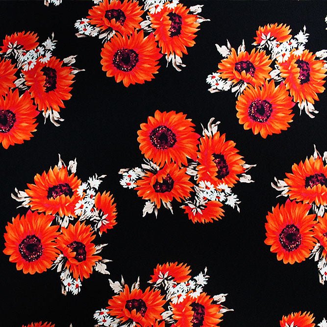 Flat sample of Sunflower Clusters Printed Spandex in color Black/Coral