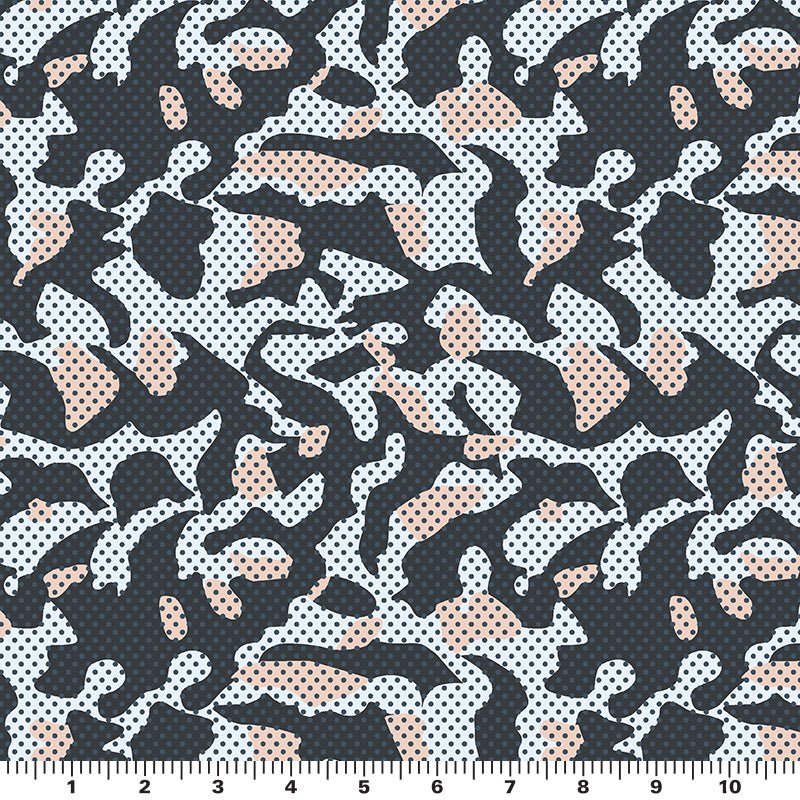 A sample of pop art camouflage printed spandex in the color charcoal-light pink and a ruler for scale.