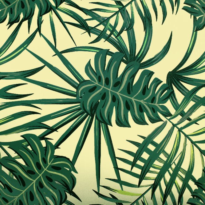 A flat sample of palm fronds and monstera printed spandex.