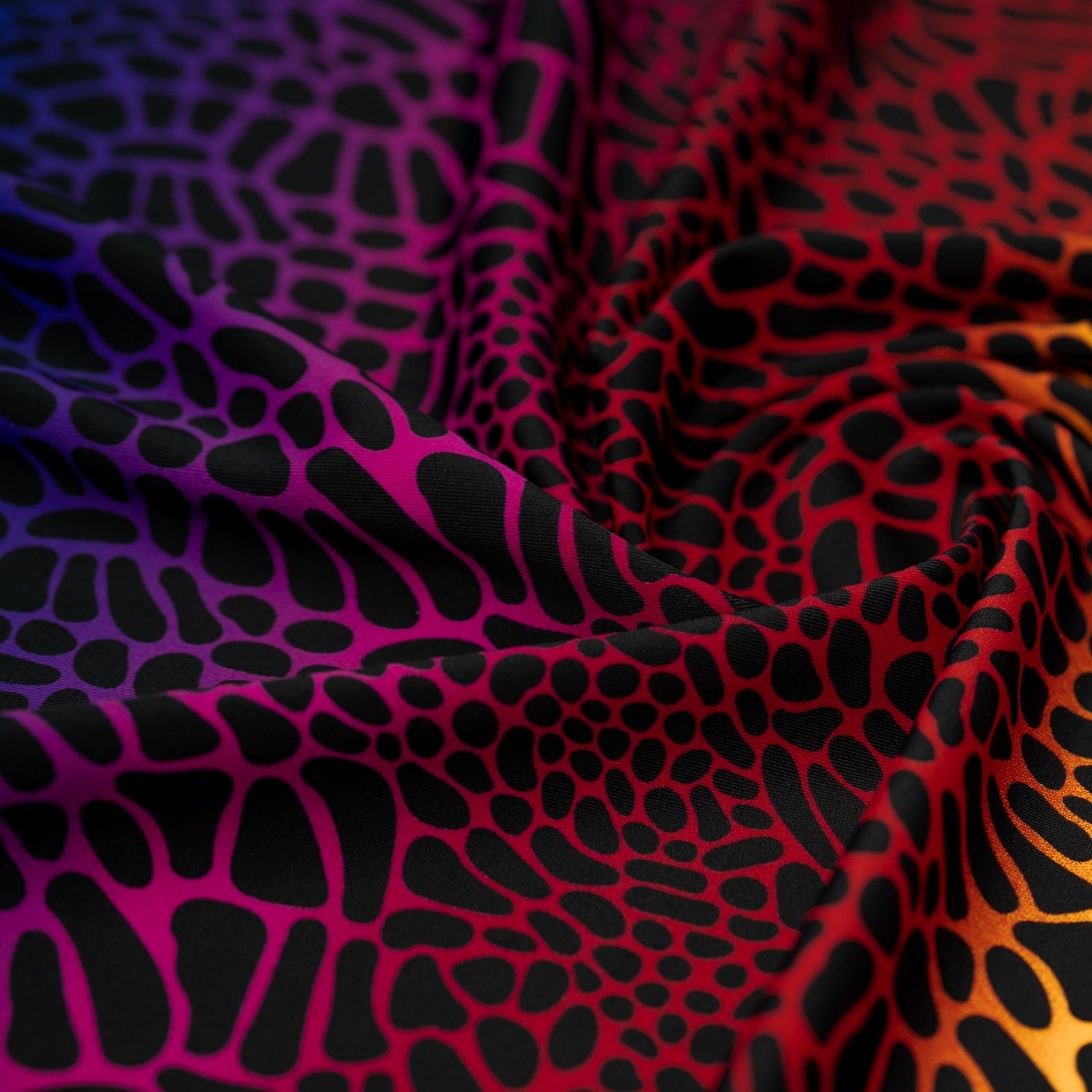 Swirled sample shot of Multicolor Safari Spots Printed Spandex