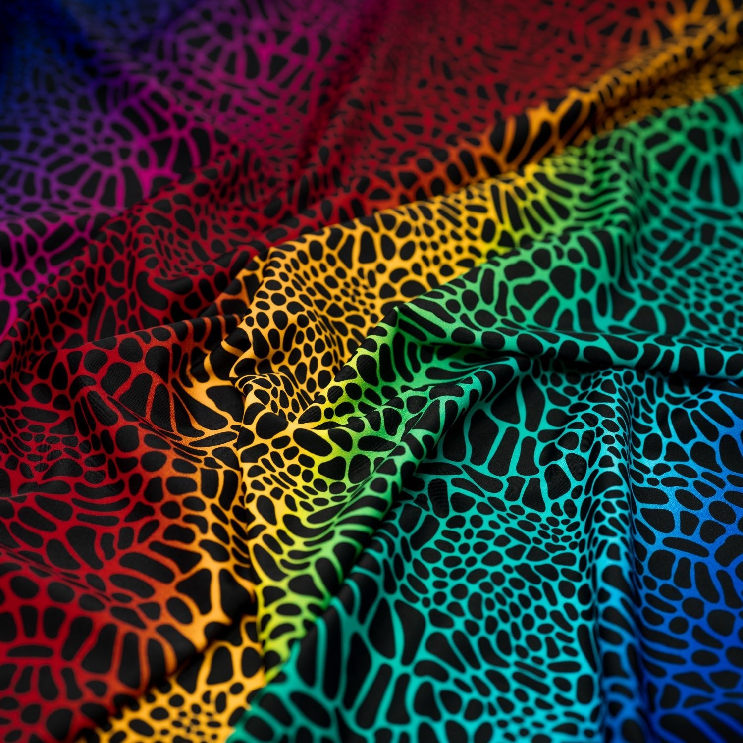 A crumpled piece of Multicolor Safari Spots Printed Spandex