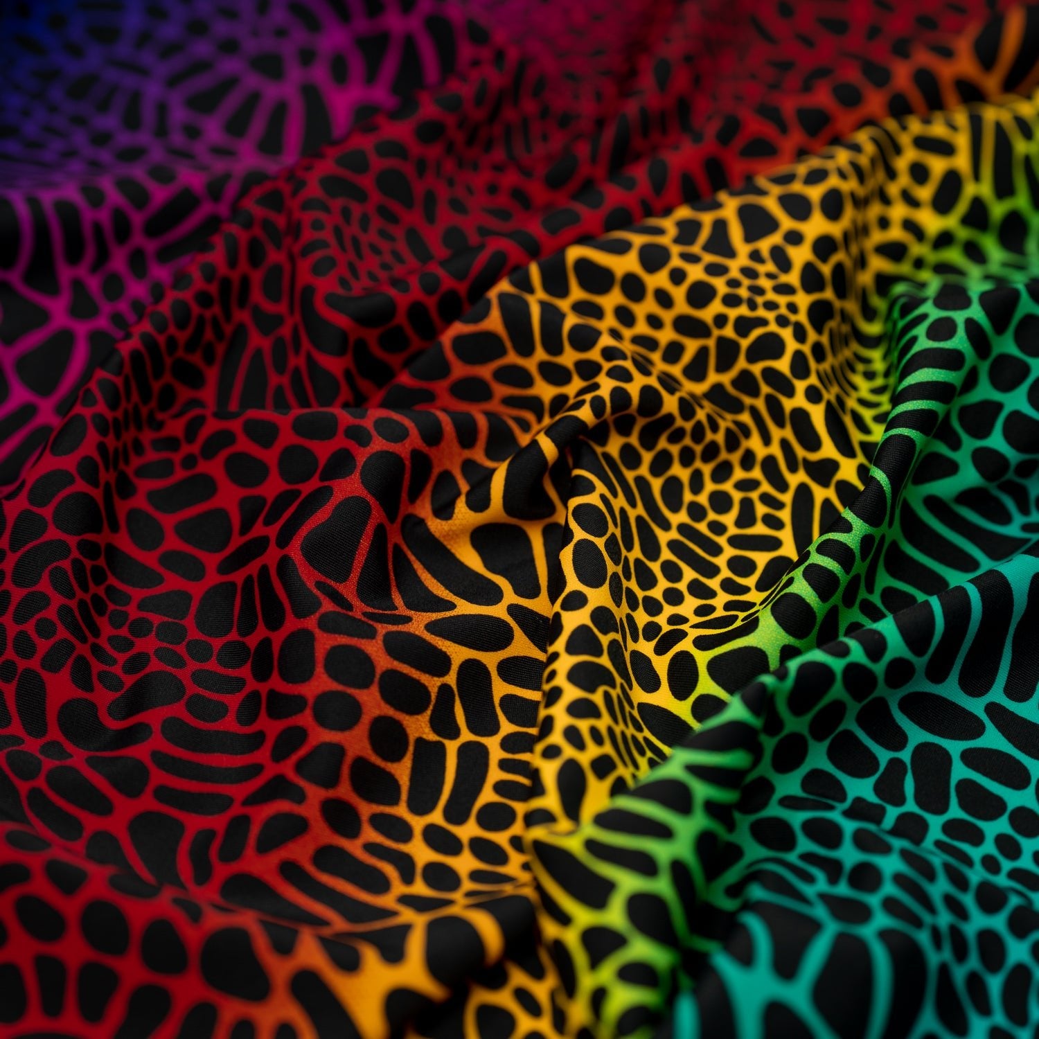 A crumpled piece of Multicolor Safari Spots Printed Spandex