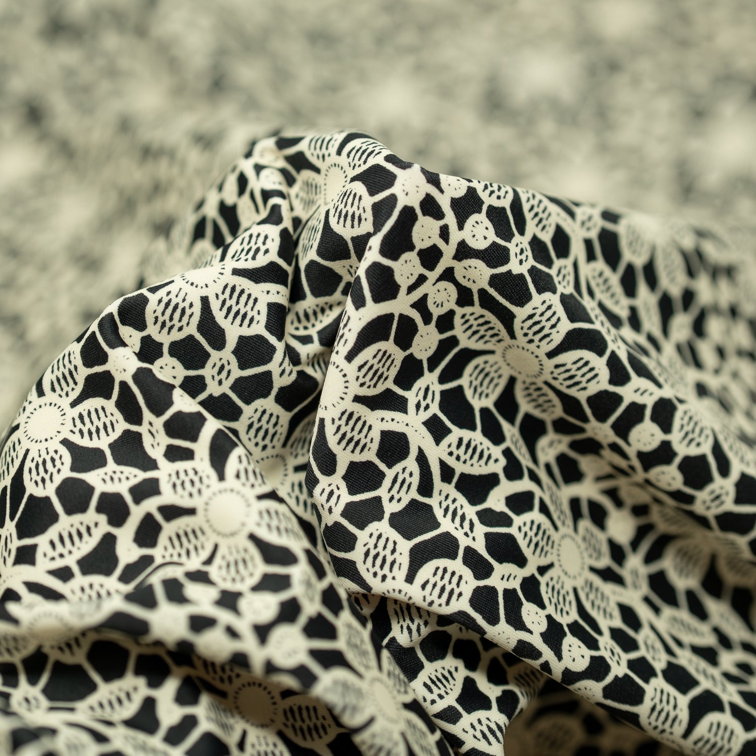 Detailed interior shot of Ivory Flower Lace Pattern on Black Printed Spandex
