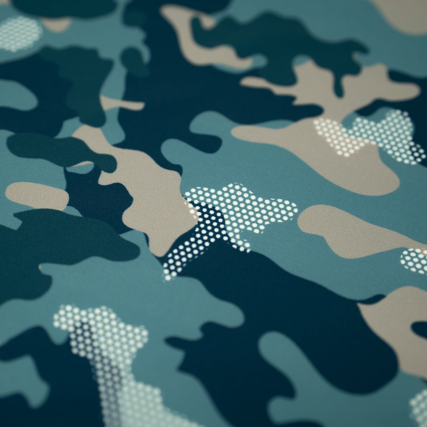 A flat sample of Fiji Camouflage Printed Spandex in the color navy-blue-white-brown
