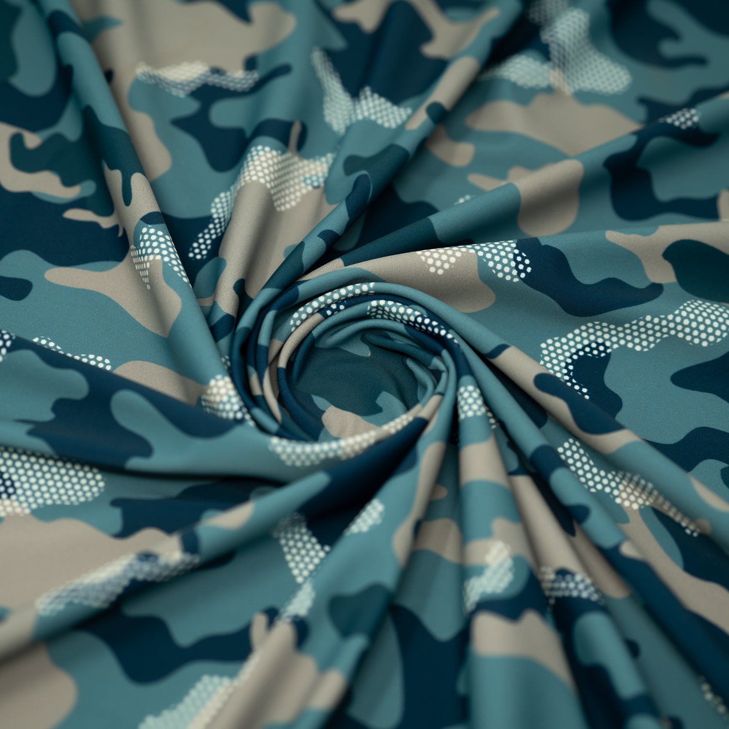 Swirled sample shot of Fiji Camouflage Printed Spandex in the color navy-blue-white-brown