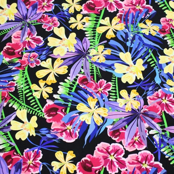 A flat sample of Hawaiian Flowers and Fronds Printed Spandex.