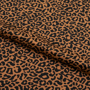 A sample piece of Groove Leopard Pattern Printed Spandex Fabric.