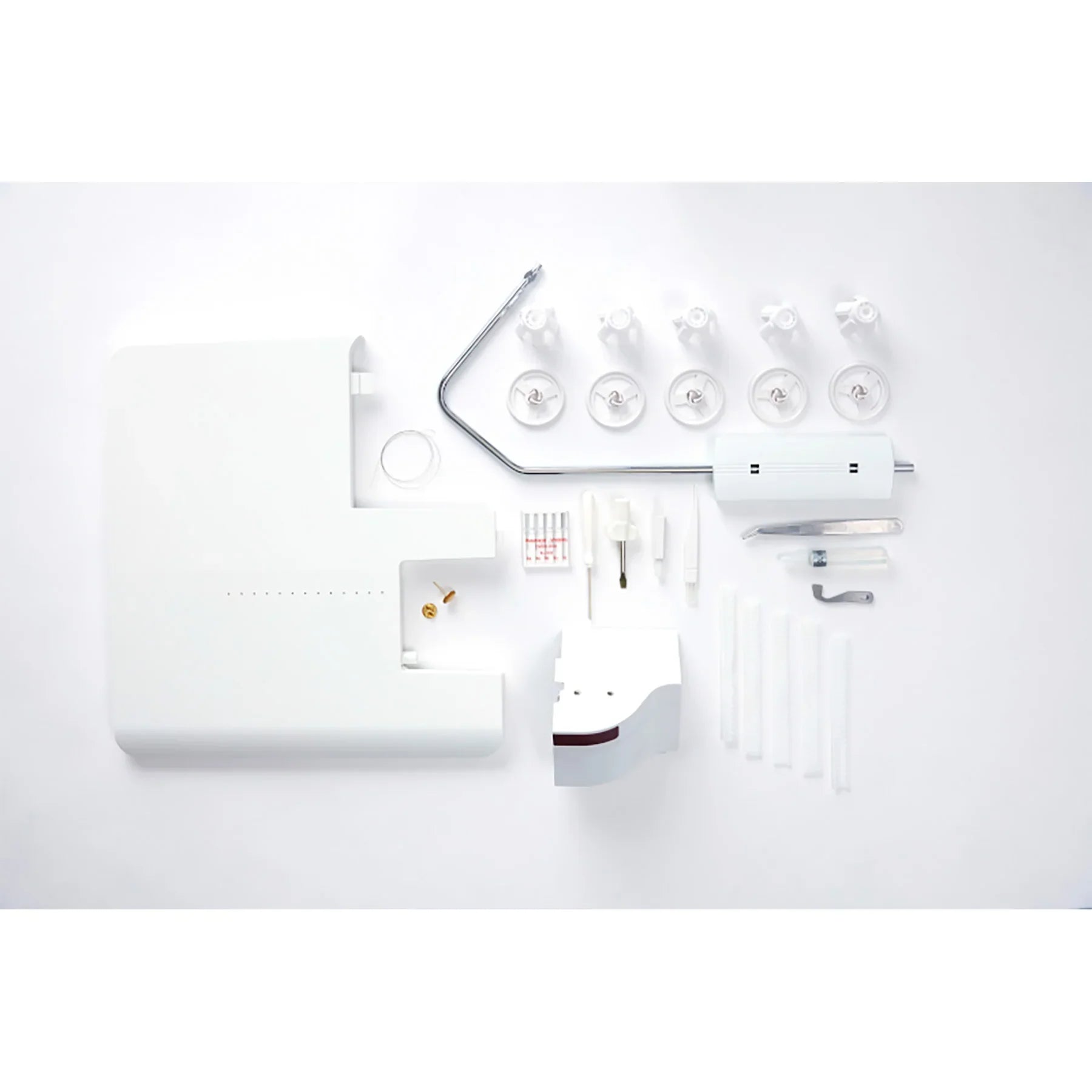 A Sample of HUSQVARNA VIKING AMBER Air S | 500 Coverlock Machine with accessories.