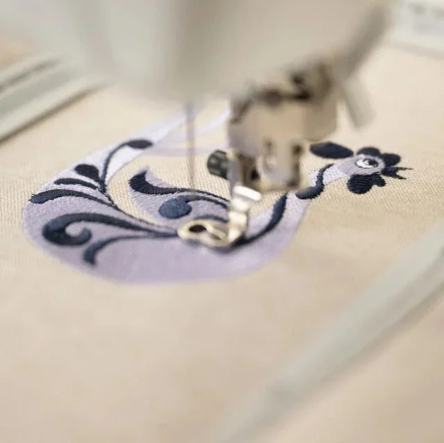 A sample of HUSQVARNA VIKING DESIGNER QUARTZ 29 Sewing & Embroidery Machine.