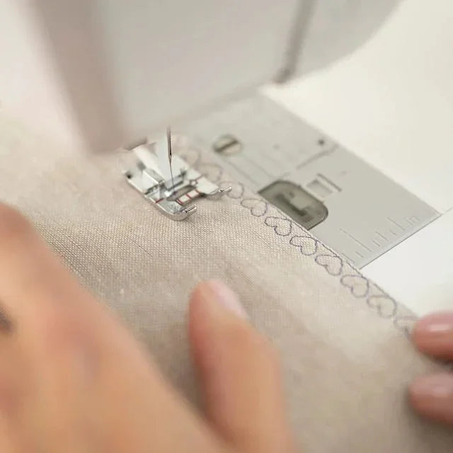 A sample of HUSQVARNA VIKING DESIGNER QUARTZ 29 Sewing & Embroidery Machine.
