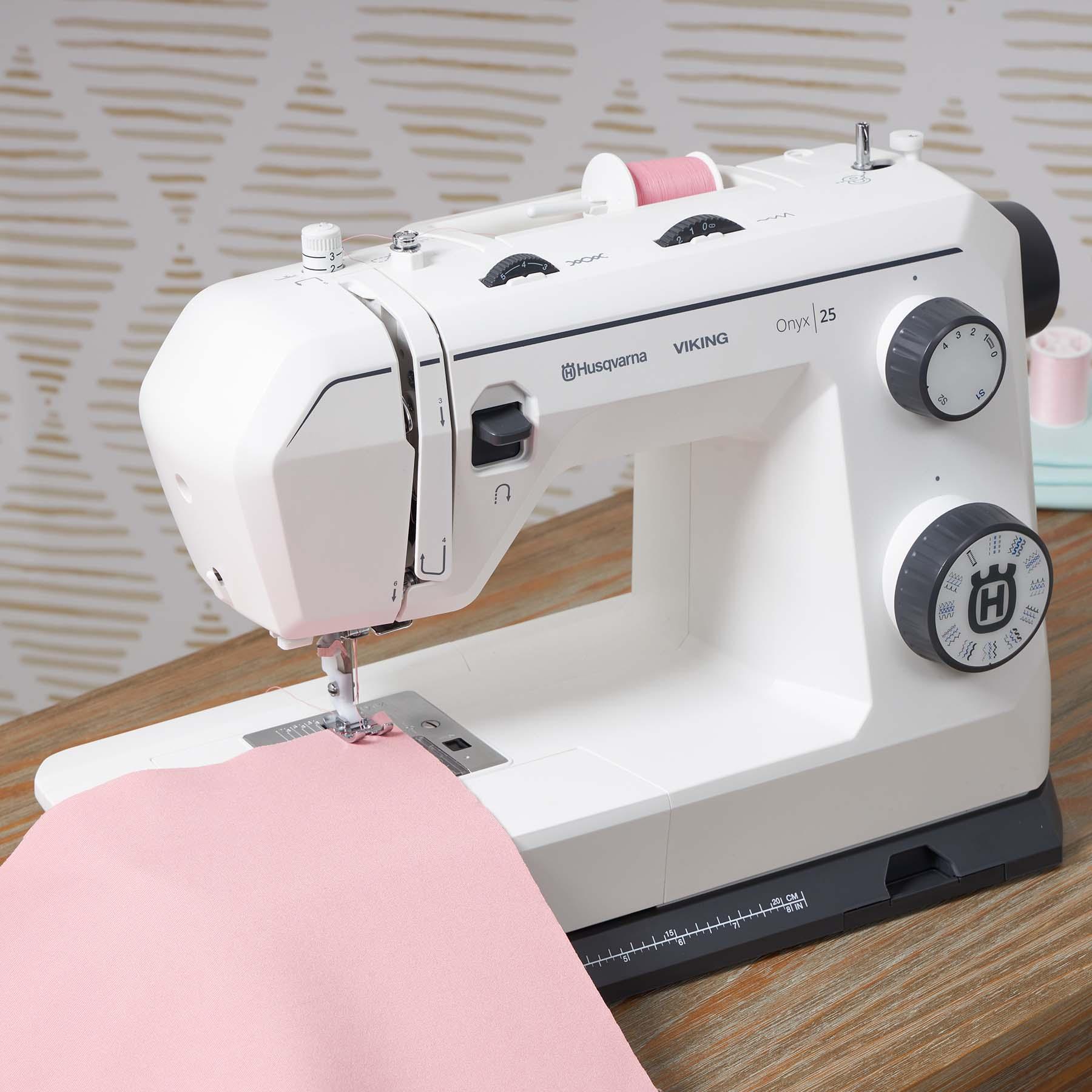 Sewing fabric using HUSQVARNA VIKING ONYX 25 Sewing machine.