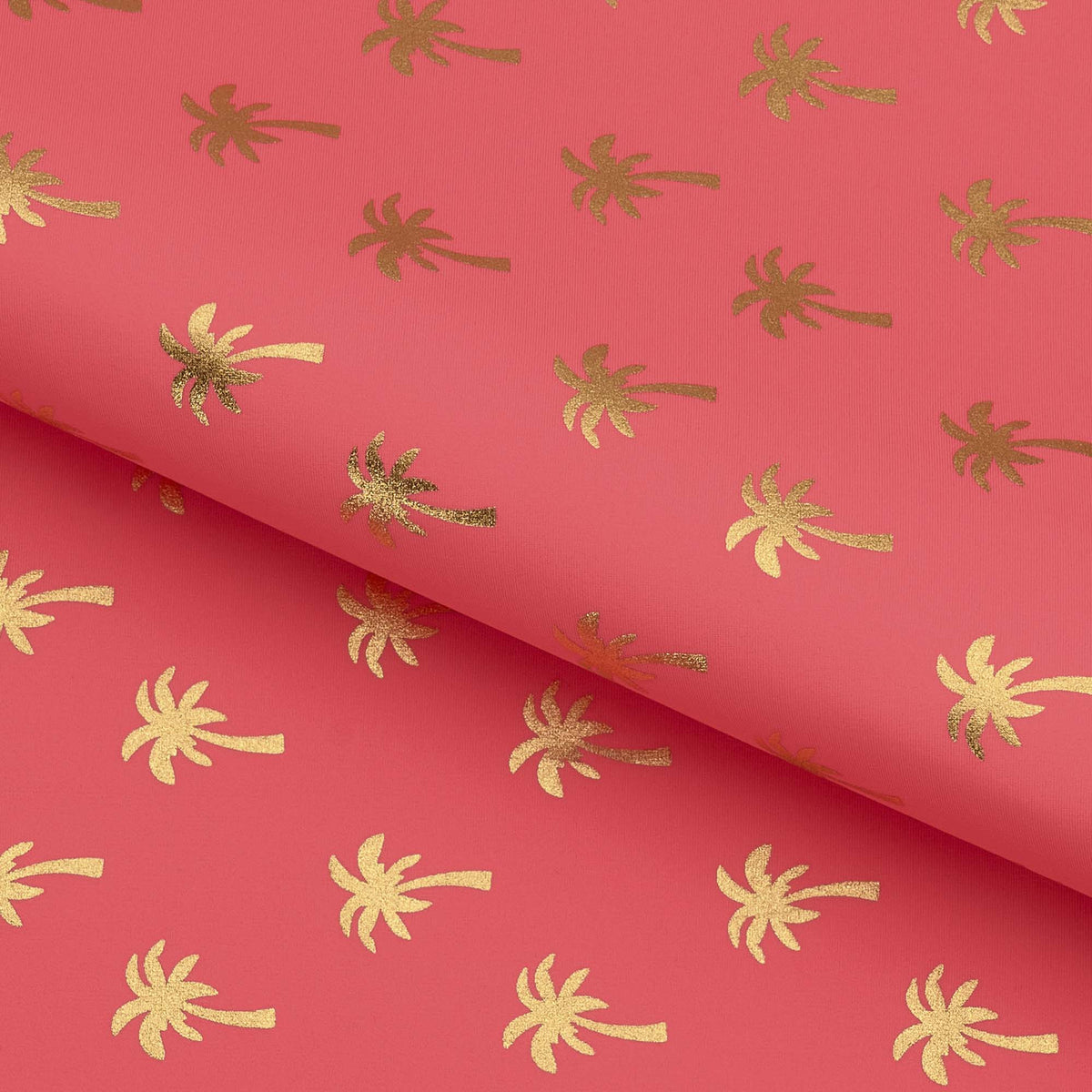 A foiled piece of Palm Trees Foil In Pink Printed Spandex Fabric in color gold/pink.