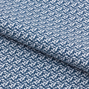 A piece of Tetris Blocks Printed On Recycled Spandex Fabric in color white/navy.