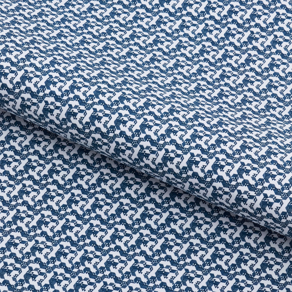 A piece of Tetris Blocks Printed On Recycled Spandex Fabric in color white/navy.