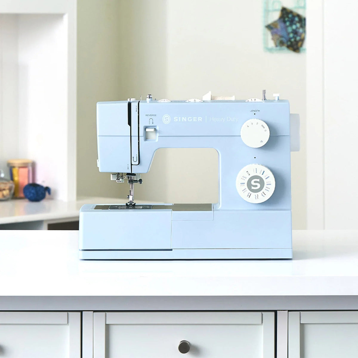 A sample of SINGER Heavy Duty 4423 Meltwater Blue Sewing Machine.