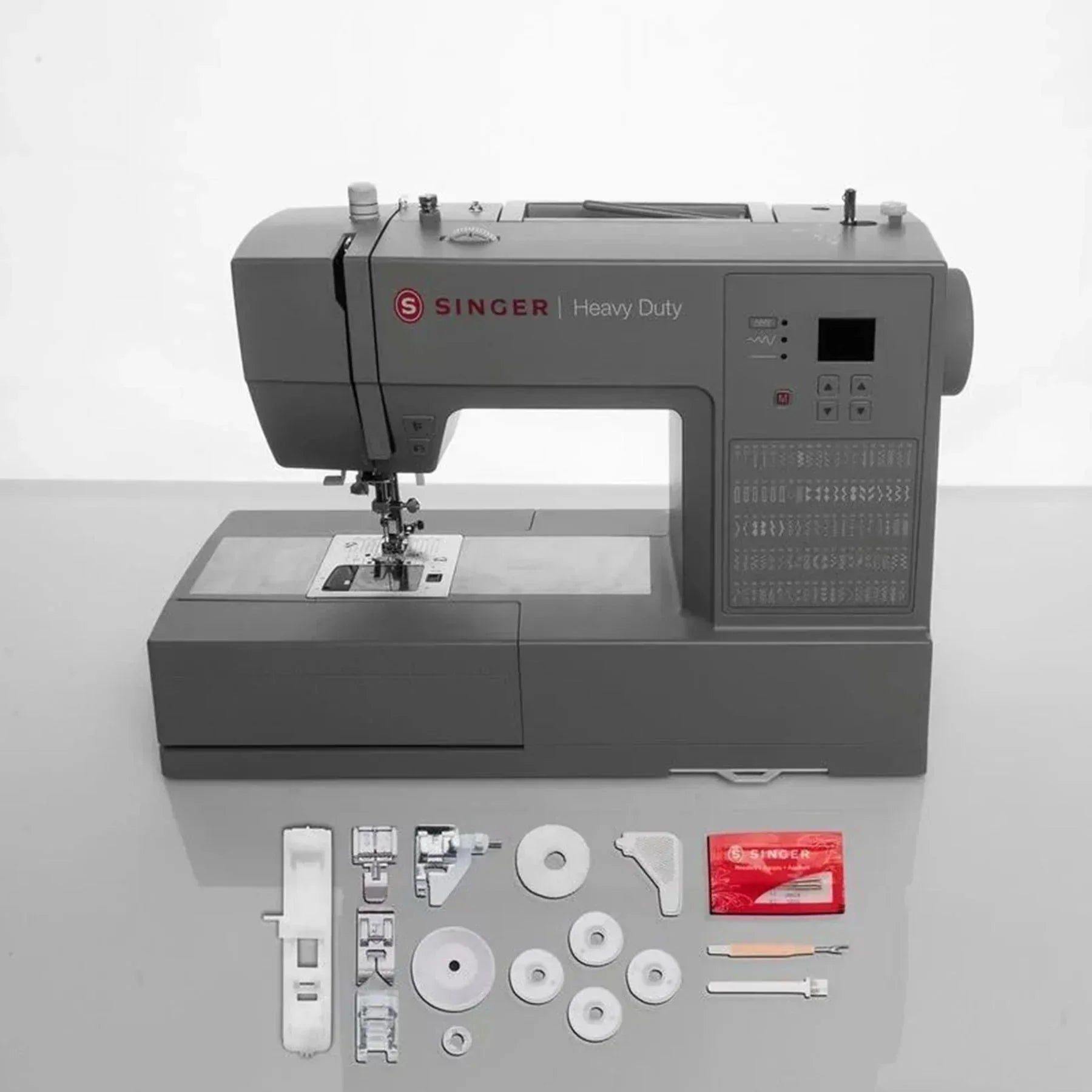 A sample of the Singer Heavy Duty 6620C Sewing Machine with accessories included.
