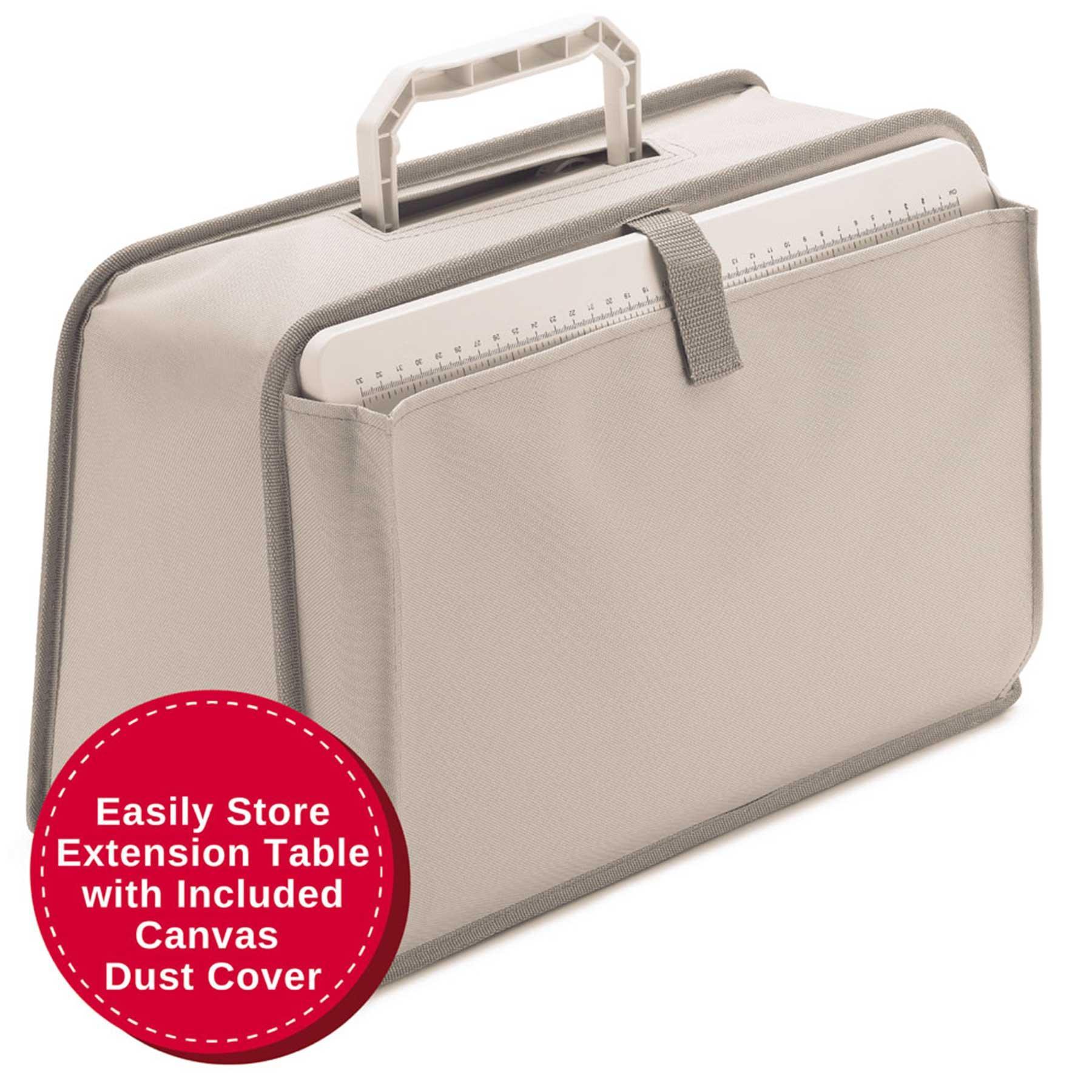 Beige carrying case with extension table and included canvas dust cover.