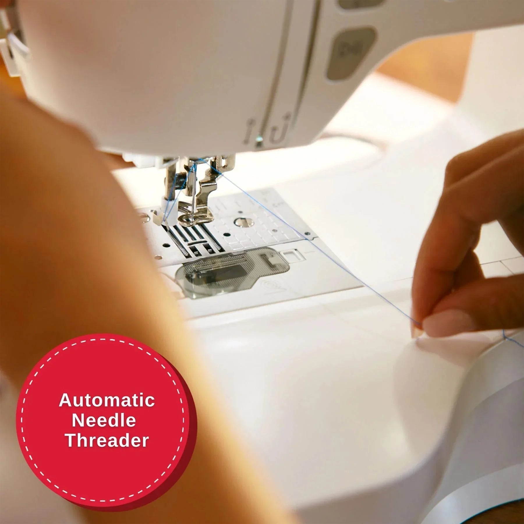 Automatic needle threader of the SINGER SE9180 Sewing & Embroidery Machine sewing fabrics.