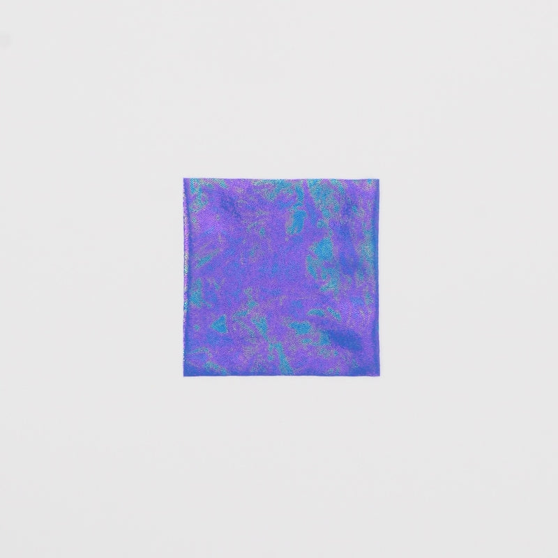 Close-up video of Prismatic Foiled Spandex Fabric in color Royal/Rainbow showcasing its looks and ability to stretch as a fabric.