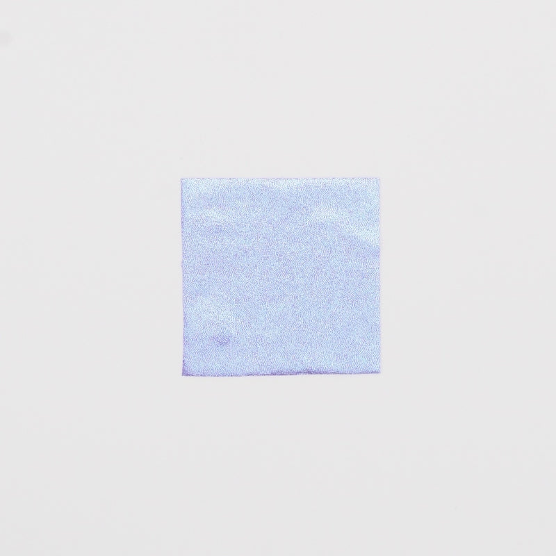 Close-up video of Mystique Foiled Spandex Fabric in color Lilac/Baby Blue showcasing its looks and ability to stretch as a fabric.