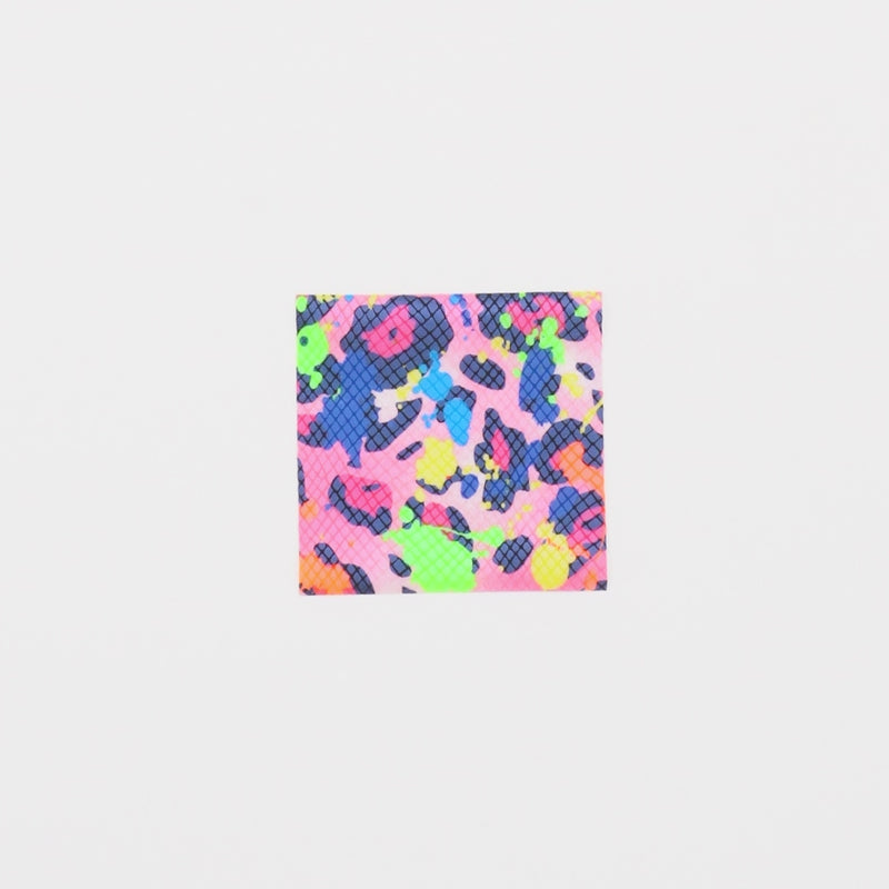 Close-up video of Party Animal Foil Printed Spandex showcasing its looks and ability to stretch as a fabric.