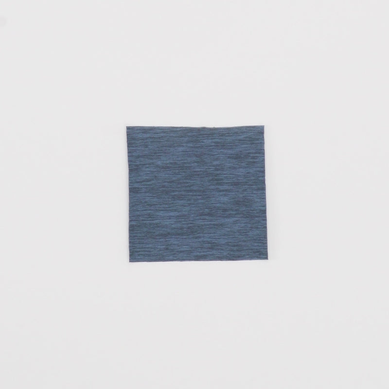 Close-up video of Eco Delish Double Peached Melange Fabric showcasing its looks and ability to stretch as a fabric.