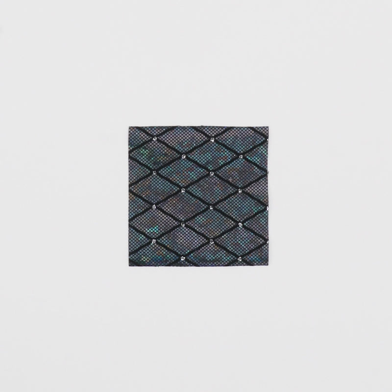 Close-up video of Argyle Shattered Glass Foiled Spandex Fabric showcasing its looks and ability to stretch as a fabric.
