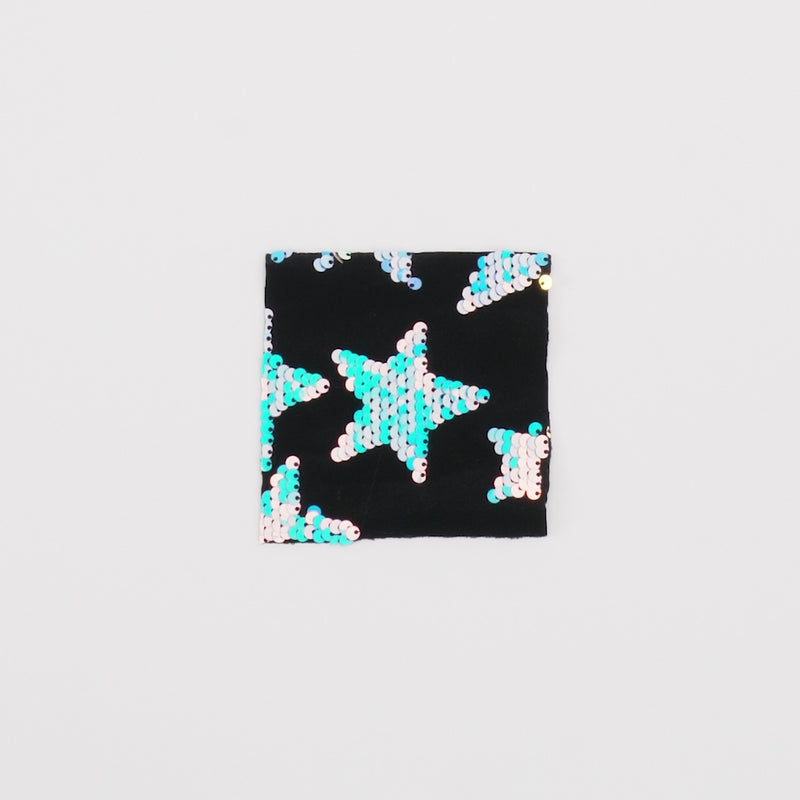 Close-up video of Starlight Stretch Velvet Flip Sequin showcasing its looks and ability to stretch as a fabric.