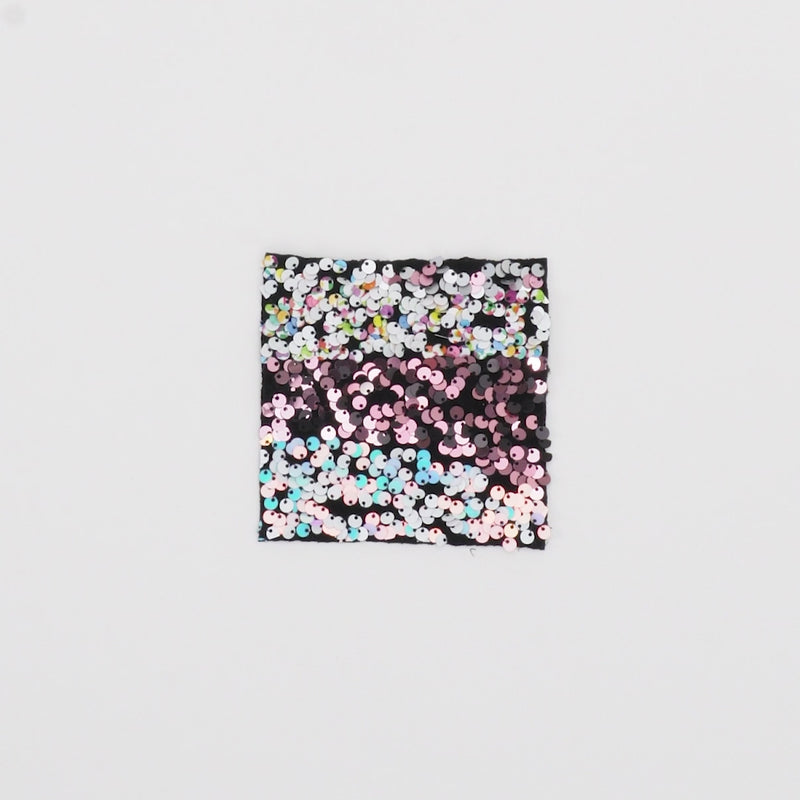Close-up video of Swell Stretch Velvet Sequin Fabric showcasing its looks and ability to stretch as a fabric.