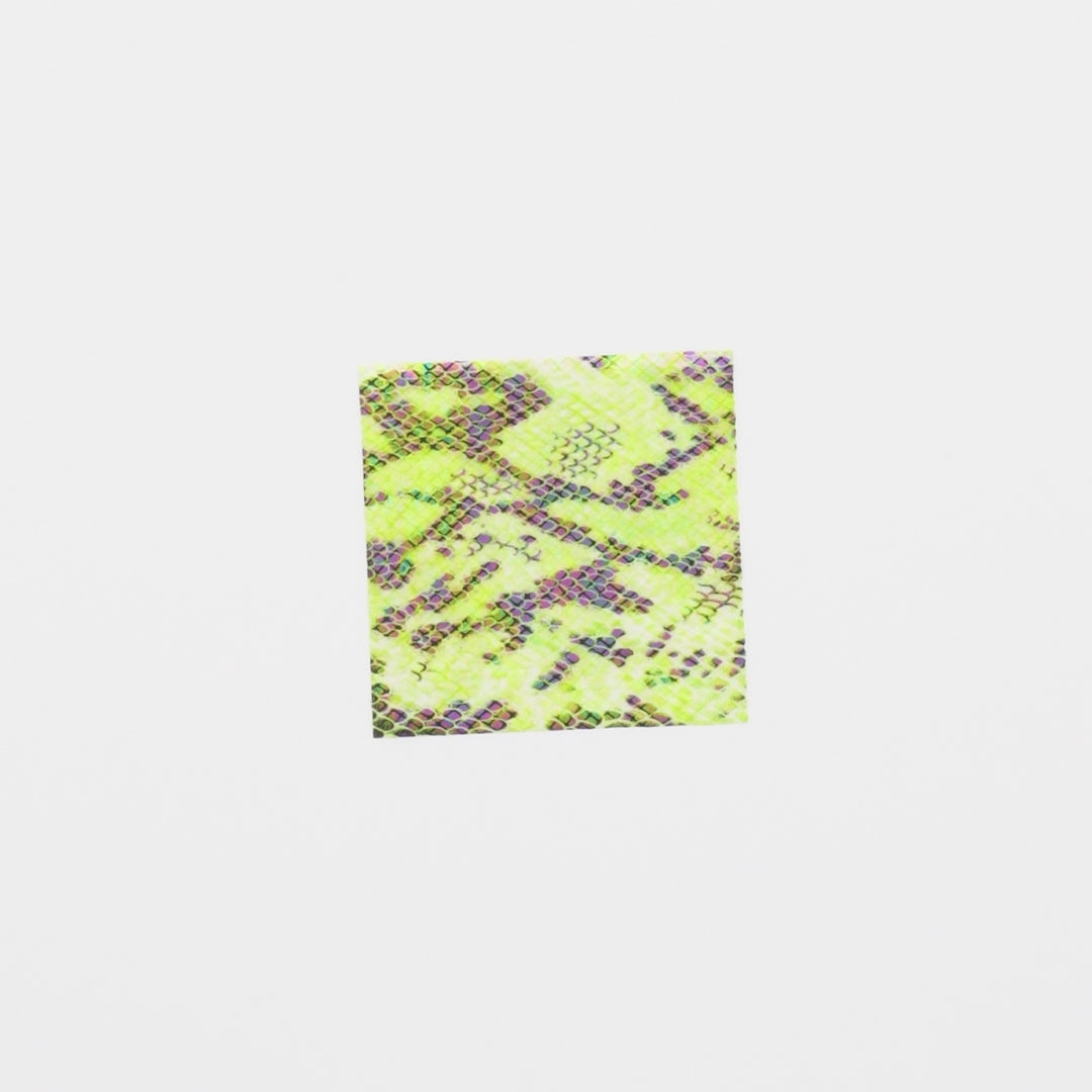 Load video: Close-up video of Rattlesnake Foil Printed Spandex fabric showcasing its looks and ability to stretch as a fabric.