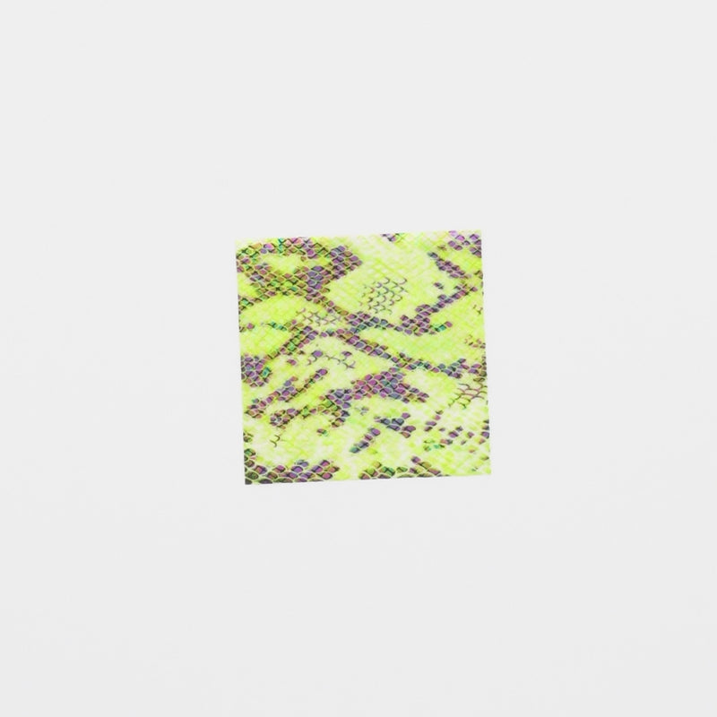 Close-up video of Rattlesnake Foil Printed Spandex fabric showcasing its looks and ability to stretch as a fabric.