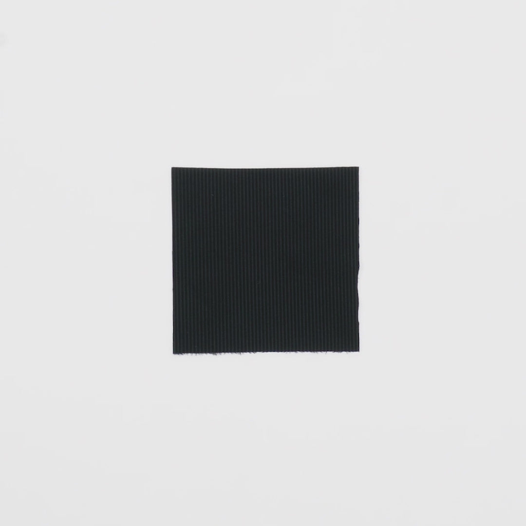 Load video: Close-up video of Ribbed Spandex fabric showcasing its looks and ability to stretch as a fabric.