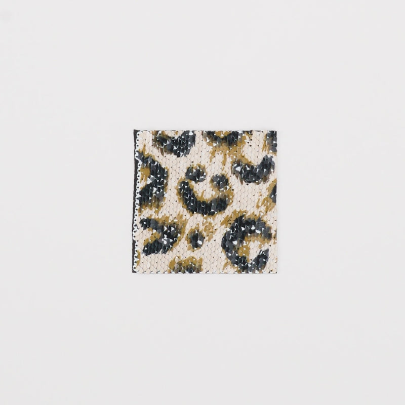 Close-up video of Cheetah Printed Flip Sequin Spandex Fabric showcasing its looks and ability to stretch as a fabric.