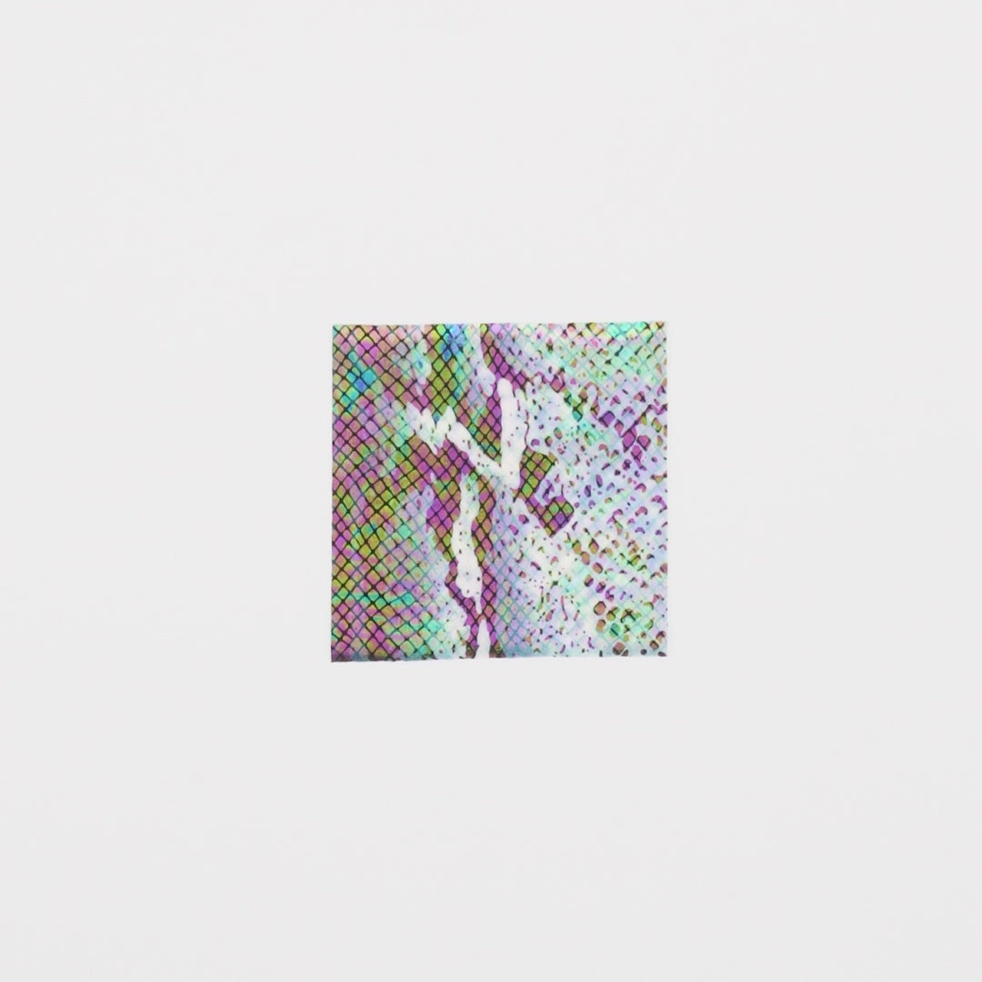 Load video: Close-up video of Mamba Foil Printed Spandex showcasing its looks and ability to stretch as a fabric.