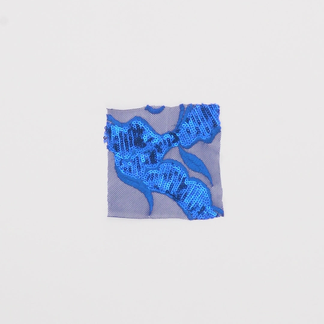 Close-up video of renaissance stretch mesh sequin showcasing its looks and ability to stretch as a fabric.