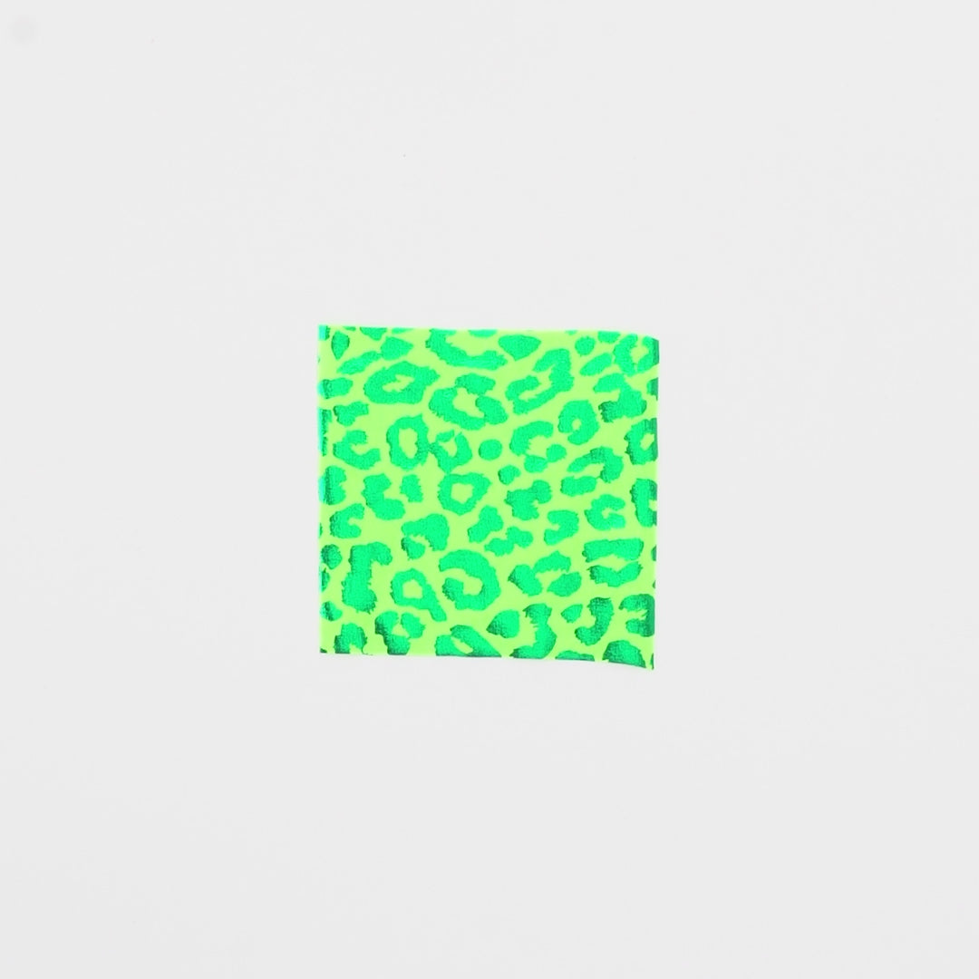 Load video: Close-up video of Loud Leo Foil Printed Spandex Fabric showcasing its looks and ability to stretch as a fabric.