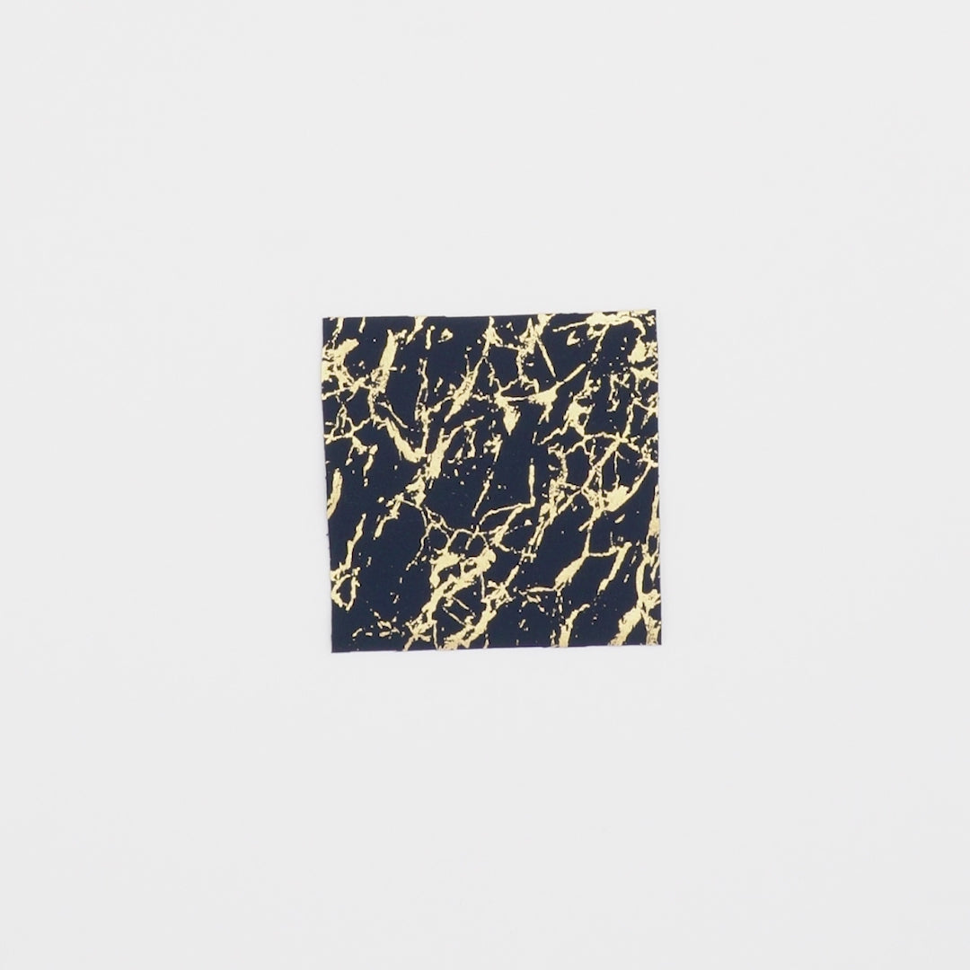 Load video: Close-up video of Cracked Foil Printed Microflex Fabric showcasing its looks and ability to stretch as a fabric.