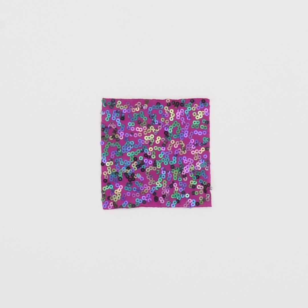 Load video: Close-up video of Night Sky Spandex Sequin fabric showcasing its looks and ability to stretch as a fabric.