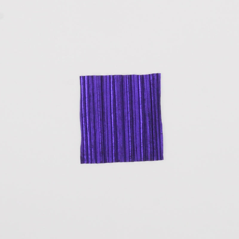 Close-up video of Titanium Pleated Polyester Fabric showcasing its looks and ability to stretch as a fabric.