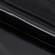 Slick PU Nylon Spandex Fabric in Black, rolled to show its smooth, glossy PU finish.